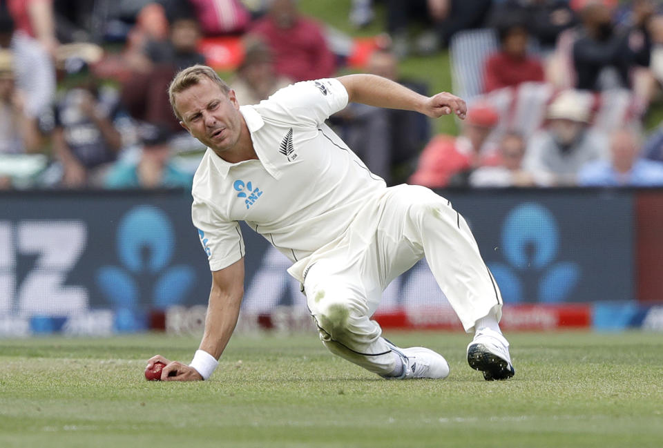 New Zealand's Neil Wagner fields the ball off his own bowling during play on day one of the second cricket test between New Zealand and India at Hagley Oval in Christchurch, New Zealand, Saturday, Feb. 29, 2020. (AP Photo/Mark Baker)