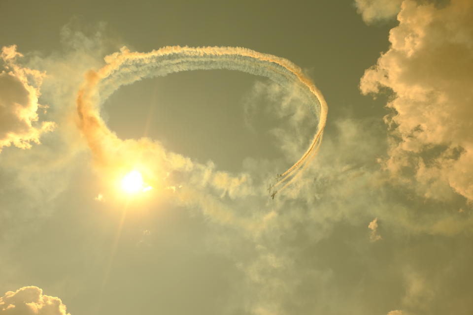 Low Angle View Of Vapor Trails Against Sky