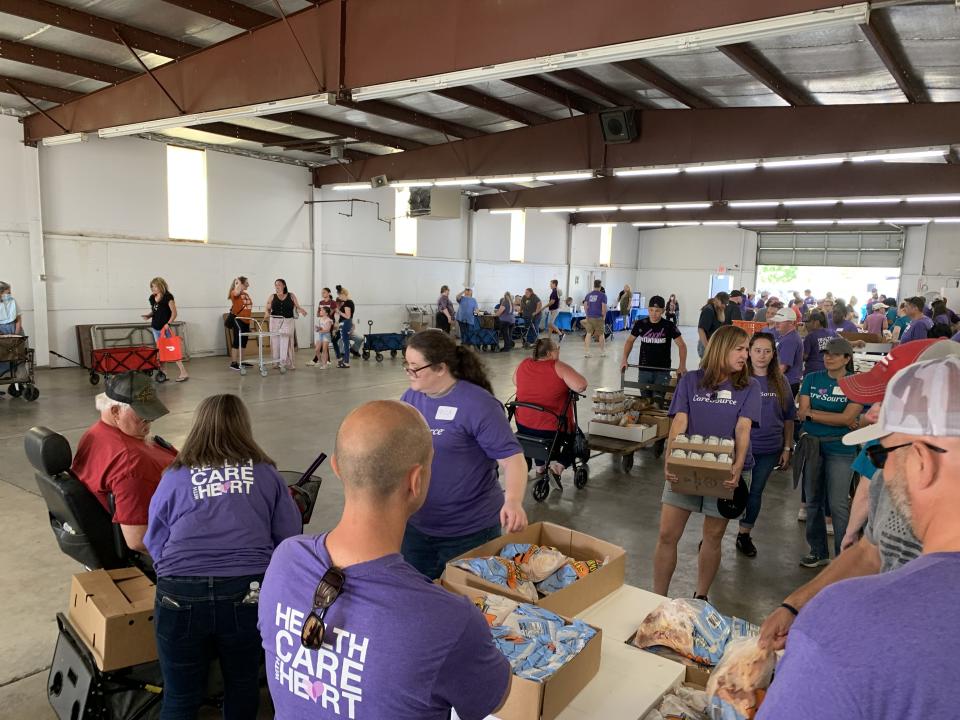 Dayton CareSource Foodbank partnered with Premier Health Tuesday to host a mass food distribution at the Preble County Fairgrounds, as well as offer free health services to interested members of the public. Available services included biometric screenings, blood pressure checks, and hemoglobin A1C testing.