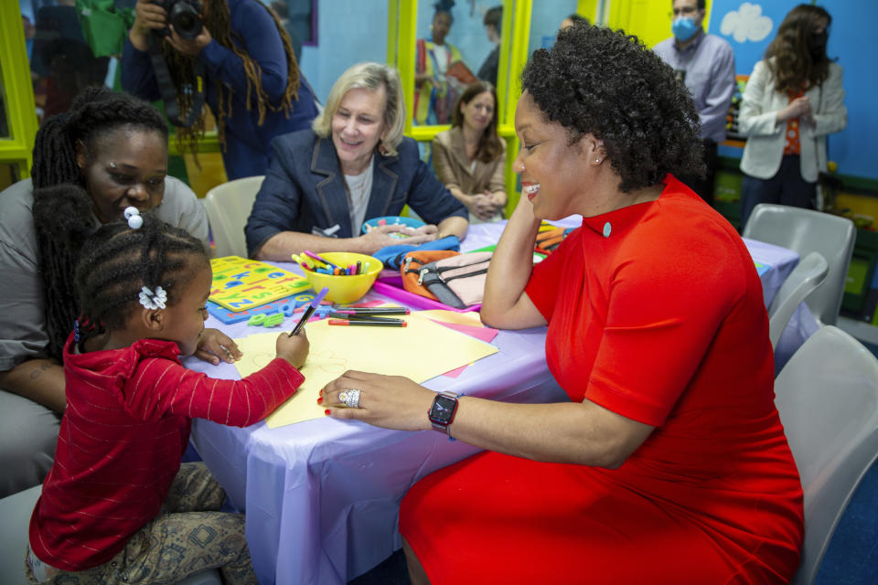 Commissioner of the New York City Department of Correction Lynelle Maginley-Liddie, right, sits in the newly opened preschool play and learn hub for inmate mothers and visiting children in the Rose M. Singer Center at the Rikers Island jail complex in the Bronx borough of New York, on Tuesday, May 7, 2024. (AP Photo/Ted Shaffrey)