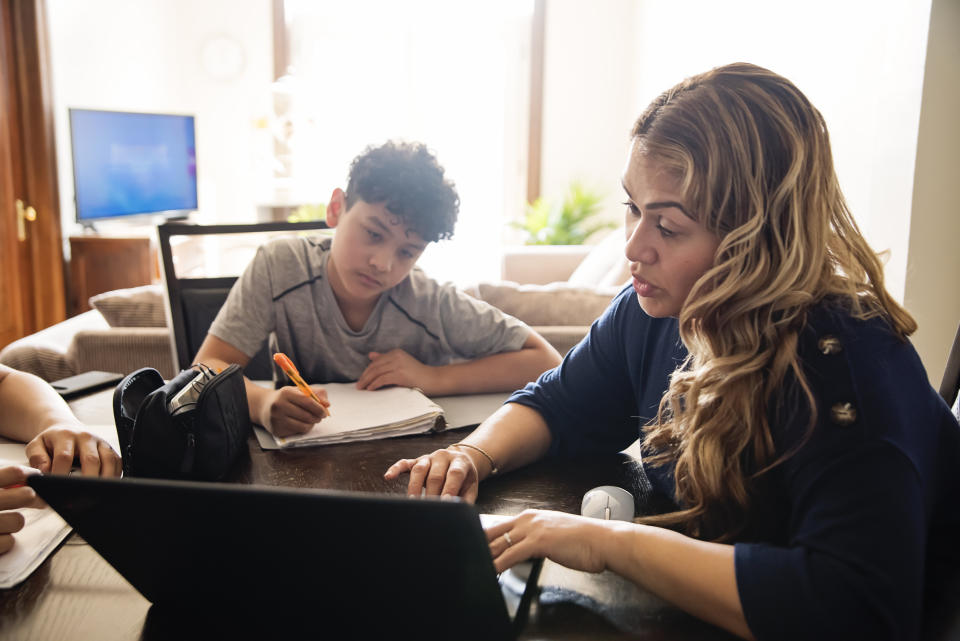 Therapists are concerned about parents' stress as they monitor their children&rsquo;s virtual learning while working. (Photo: martinedoucet via Getty Images)