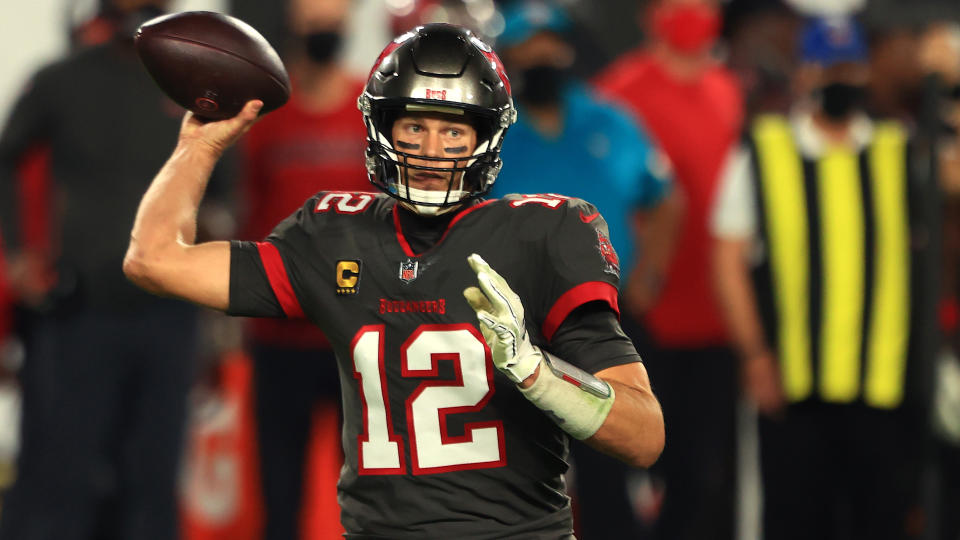 TAMPA, FLORIDA - NOVEMBER 23: Tom Brady #12 of the Tampa Bay Buccaneers looks to pass against the Los Angeles Rams during the second quarter in the game at Raymond James Stadium on November 23, 2020 in Tampa, Florida. (Photo by Mike Ehrmann/Getty Images)