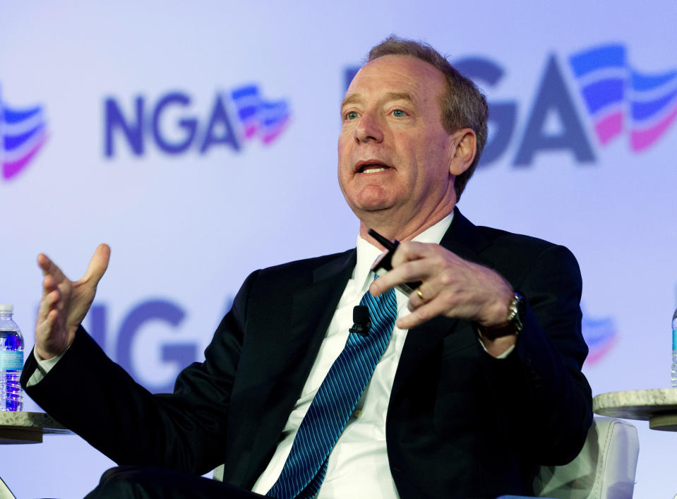 FILE - In this Feb. 25, 2018, file photo, Microsoft President Brad Smith speaks during the panel Economic Development at the National Governor Association 2018 winter meeting in Washington. Microsoft is turning to a former rival to improve the security of computing devices. Microsoft President Brad Smith said Monday, April 16, at the RSA security conference in San Francisco that the company will use software based on the Linux operating system, not its own Windows operating system, for new security features to protect internet-connected toys and other consumer devices. (AP Photo/Jose Luis Magana, File)