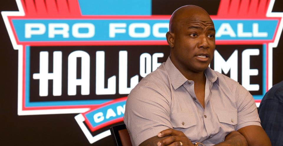 DeMarcus Ware answers a question at the Pro Football Hall of Fame during a visit, March 16, 2023.