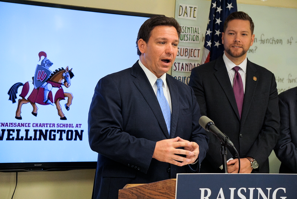 Gov. Ron DeSantis announces his approval of an $800 million line in Florida's budget for teacher compensation during his visit to Wellington's Renaissance Charter School on March 21, 2022.