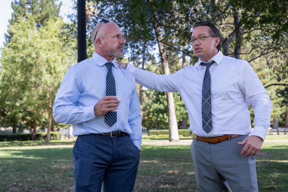 Gunner Johnson, 49, left, and Christian Branscombe, 48, formerly sentenced to life-without-parole, talk about their support for Senate Bill 94 on Aug. 23. Johnson was shot by Branscombe decades ago and the two reunited through a restorative justice process. Senate Bill 94 would allow some inmates convicted of crimes that took place before mid-1990 to petition a judge to have their sentences changed and seek parole.