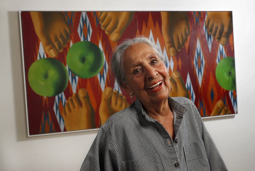 LOS ANGELES, CA-JUNE 15, 2018: Painter Luchita Hurtado, 97, is photographed next to her artwork, an untitled oil on canvas from 1971, on display as part of the "Made in LA 2018" biennial exhibit at the Hammer Museum in Los Angeles on June 15, 2018. (Mel Melcon/Los Angeles Times)