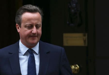 Britain's Prime Minister David Cameron leaves Number 10 Downing Street to attend Prime Minister's Questions at parliament in London, Britain June 29, 2016. REUTERS/Neil Hall