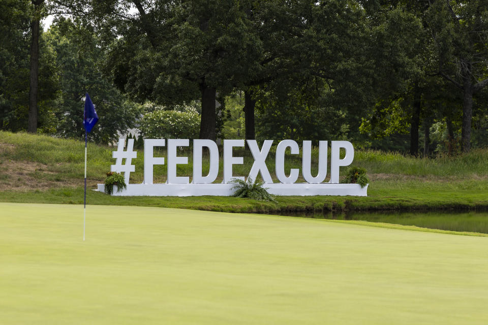 MEMPHIS, TENNESSEE - AUGUST 12: A general view of Fedex Cup signage on the 14th green prior to the FedEx St. Jude Championship at TPC Southwind on August 12, 2024 in Memphis, Tennessee. (Photo by James Gilbert/PGA TOUR via Getty Images)