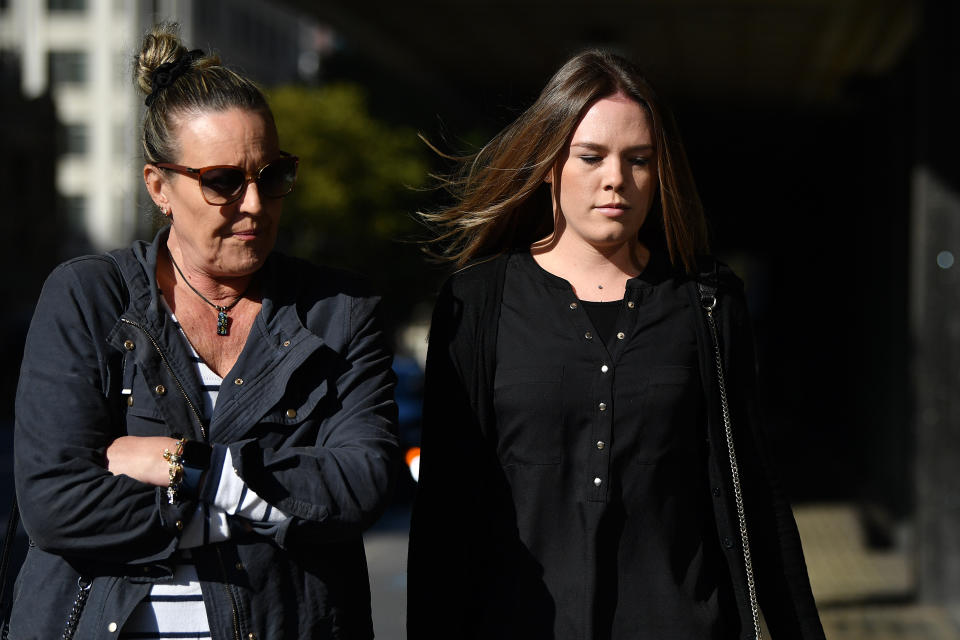 Monica Elizabeth Young (right) arrives at the Downing Centre District Court in Sydney.