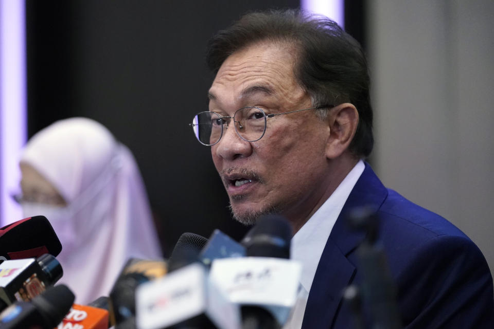 Malaysia's opposition leader Anwar Ibrahim speaks during a press conference in Kuala Lumpur, Wednesday, Sept. 23, 2020. Anwar said he has secured a majority in parliament to form a new government that is “strong, stable and formidable." (AP Photo/Vincent Thian)