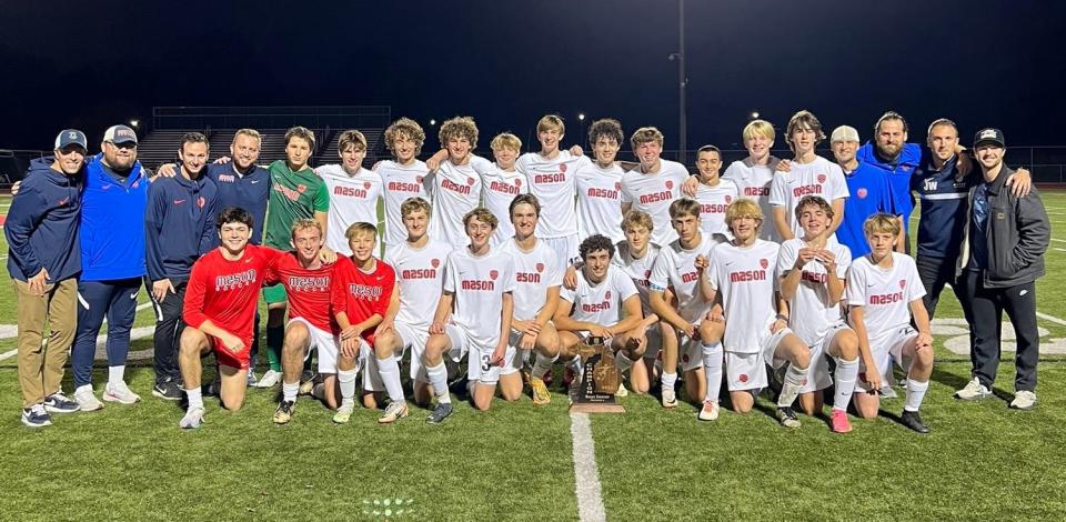 Mason boys soccer captured a Division 2 district soccer title with its 3-0 win over Dearborn Divine Child on Thursday, Oct. 27, 2023, in Dearborn.