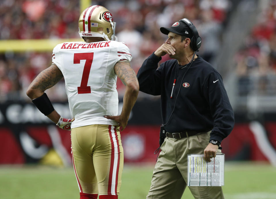 Jim Harbaugh said that any NFL team that signed Colin Kaepernick would be "very happy." (AP Photo/Ross D. Franklin)