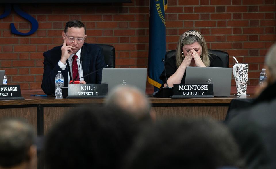 JCPS Board Members Chris Kolb, left, and Sarah McIntosh were visibly frustrated with a motion to table to a vote about ending transportation for magnet schools in the district at the Vanhoose Education Center in Louisville Ky. on April 10, 2024. Ultimately, the board voted to end transportation for all magnet programs except for Central High School and Western High School.