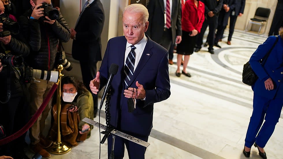 President Biden speaks to reporters after a Democratic caucus luncheon at the Senate Russell Office building to discuss voting rights and filibuster reform on Thursday, January 13, 2022.