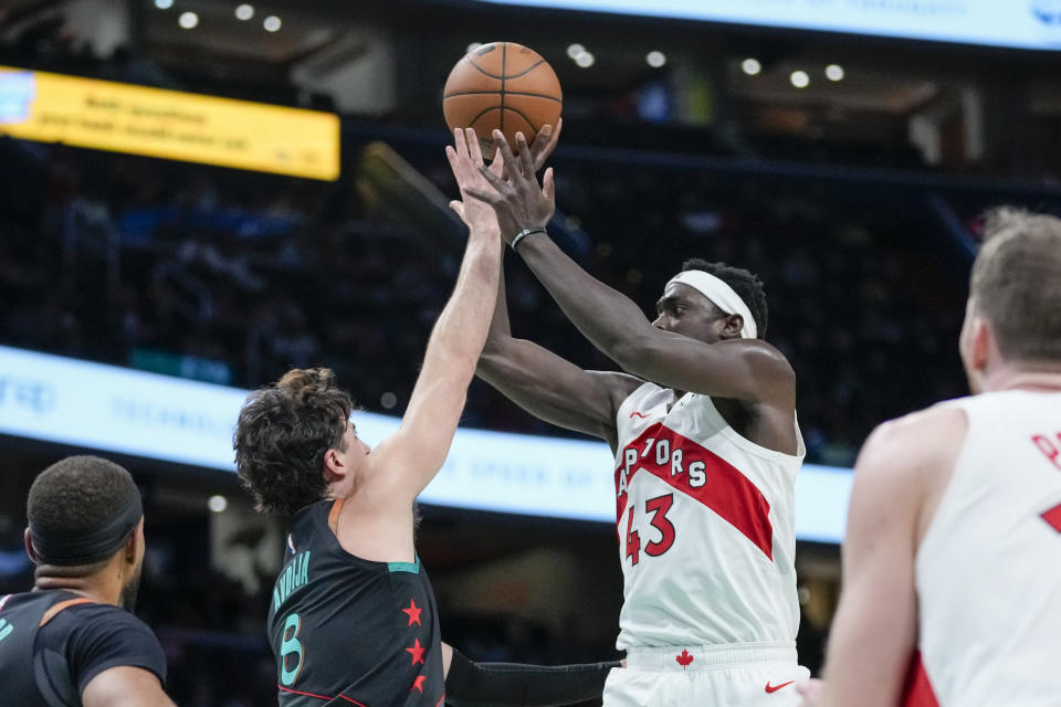 Washington Wizards forward Deni Avdija (8) defends against Toronto Raptors forward Pascal Siakam (43) during the first half of an NBA basketball game Wednesday, Dec. 27, 2023, in Washington. (AP Photo/Alex Brandon)