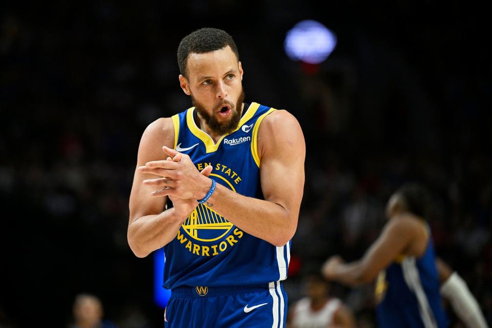 Golden State Warriors guard Stephen Curry (30) claps his hands in celebration during the second half against the Portland Trail Blazers at Moda Center in Portland on April 11, 2024.