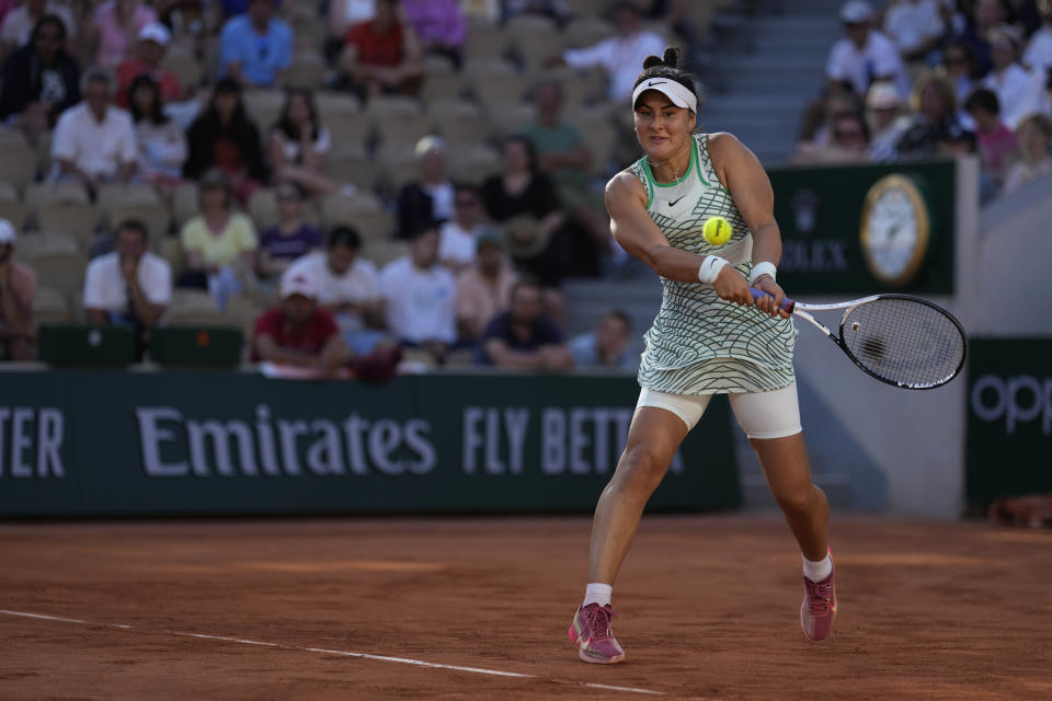 Canada's Bianca Andreescu returns the ball to Ukraine's Lesia Tsurenko during their third round match of the French Open tennis tournament at the Roland Garros stadium in Paris, Saturday, June 3, 2023. (AP Photo/Thibault Camus)