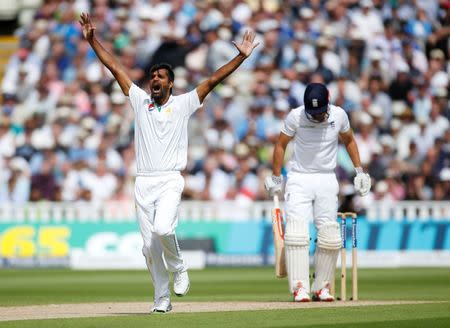 Britain Cricket - England v Pakistan - Third Test - Edgbaston - 3/8/16 Pakistan's Rahat Ali celebrates taking the wicket of England's Alastair Cook Action Images via Reuters / Paul Childs