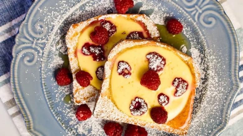 Toast with custard filling and rapsberries