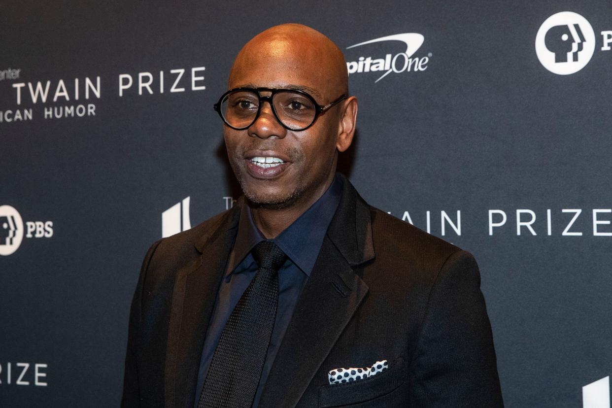 Comedian Dave Chappelle arrives at the Kennedy Center for the Mark Twain Award for American Humor on October 27, 2019 in Washington, D.C. - This years' award recipient is comedian Dave Chappelle. (Photo by Alex Edelman / AFP) (Photo by ALEX EDELMAN/AFP via Getty Images)