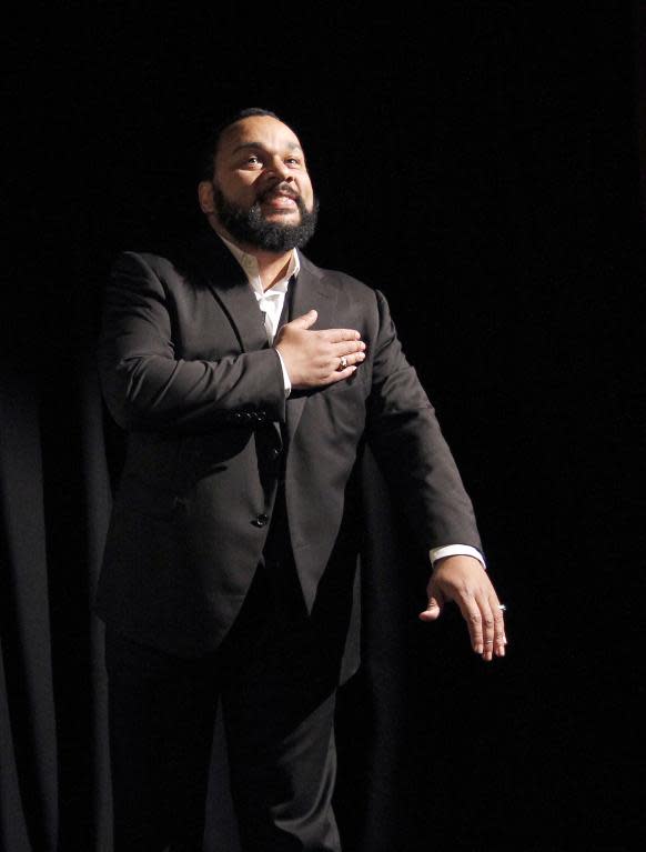 Controversial French comedian Dieudonne delivers a speech prior to the premiere of his movie "Antisemite" on the stage of the "Main d'Or" theatre in Paris on January 15, 2012