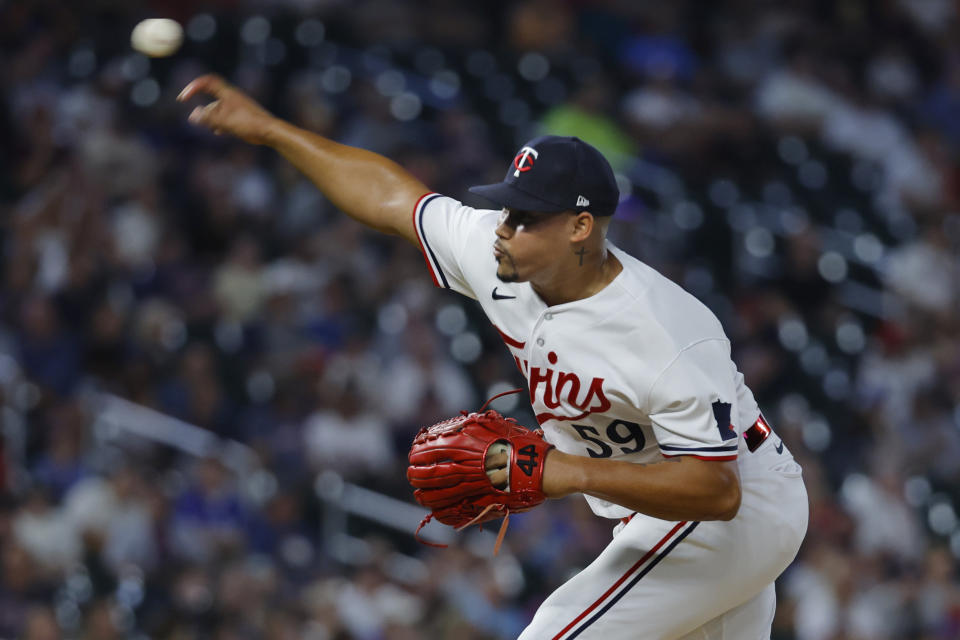 Minnesota Twins relief pitcher Jhoan Duran throws to the Detroit Tigers in the ninth inning of a baseball game Tuesday, Aug. 15, 2023, in Minneapolis. The Twins won 5-3. (AP Photo/Bruce Kluckhohn)