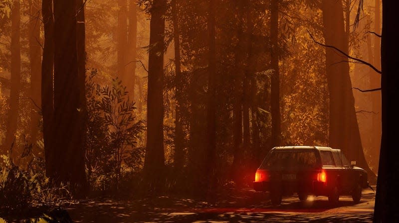 A station wagon drives through an orange-lit forest. 