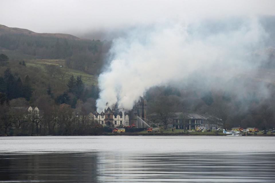 Fire: the blaze at the hotel next to Loch Lomond (Andrew Milligan/PA )