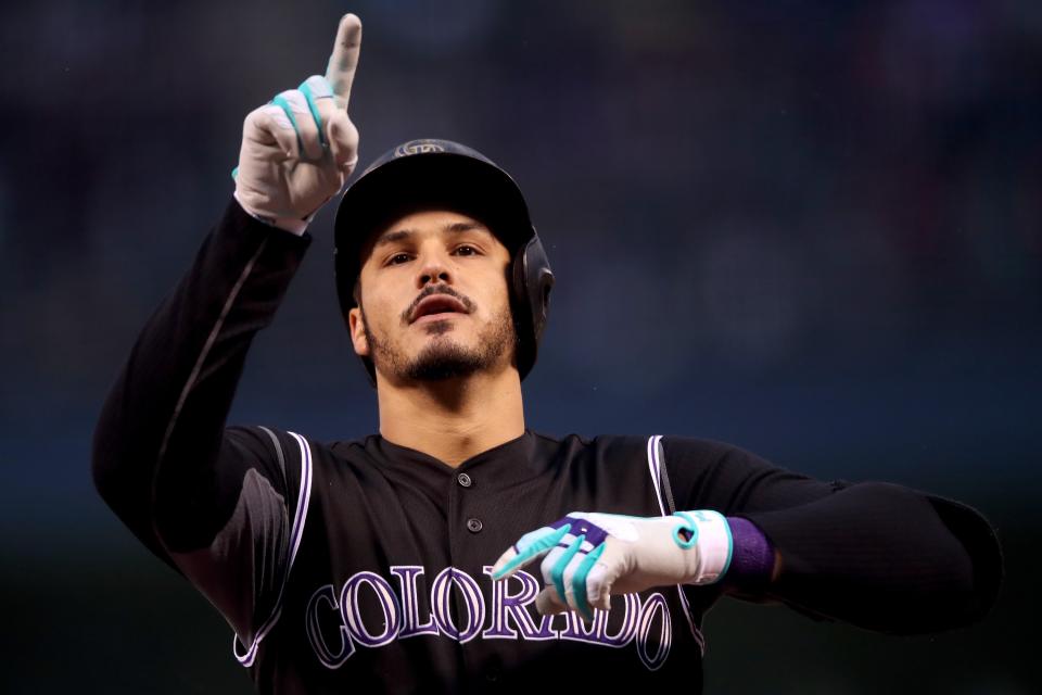 Rockies superstar Nolan Arenado is headed to the postseason for the first time. (Getty Images)