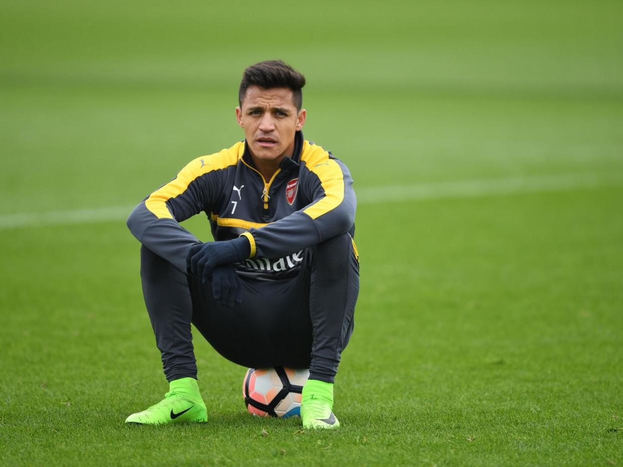 Alexis Sanchez has refused to commit himself to Arsenal: Getty