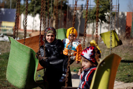 People play in Nour Park at Mosul's zoo, Iraq, February 2, 2017. REUTERS/Muhammad Hamed