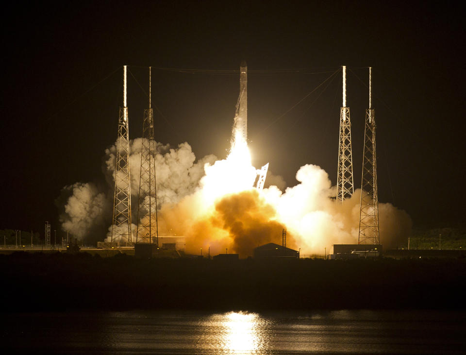 The Falcon 9 SpaceX rocket lifts off from space launch complex 40 at the Cape Canaveral Air Force Station in Cape Canaveral, Fla., early Tuesday, May 22, 2012. This launch marks the first time, a private company sends its own rocket to deliver supplies to the International Space Station.(AP Photo/John Raoux)