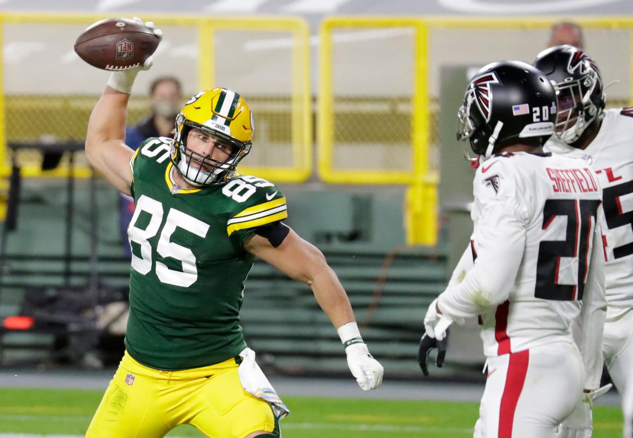 Green Bay Packers tight end Robert Tonyan spikes the ball after scoring a touchdown against the Atlanta Falcons in 2020.