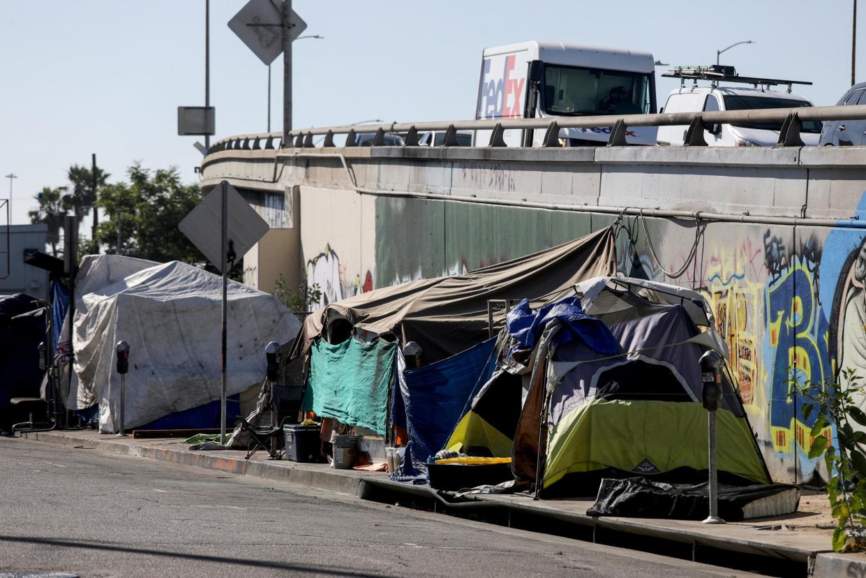 <span>A homeless encampment in Los Angeles on 6 July 2023.</span><span>Photograph: Gary Coronado/Los Angeles Times/Getty Images</span>