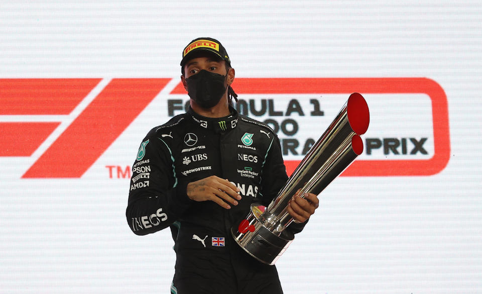 DOHA, QATAR - NOVEMBER 21: Lewis Hamilton of Mercedes wins the first place at the end of Qatari Formula One Grand Prix at the Losail International Circuit, on the outskirts of the capital city of Doha, Qatar on November 21, 2021. (Photo by Stringer/Anadolu Agency via Getty Images)