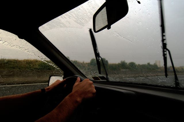 A6B0YB Driving in the rain France
