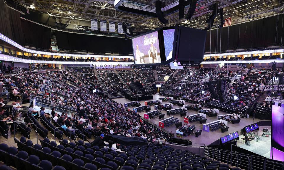 Jimmy Pitaro, chairman of ESPN, and Steve Starks, CEO of the Larry H. Miller Company, speak during the eighth annual Silicon Slopes Summit at the Delta Center in Salt Lake City on Wednesday, Sept. 27, 2023. | Jeffrey D. Allred, Deseret News