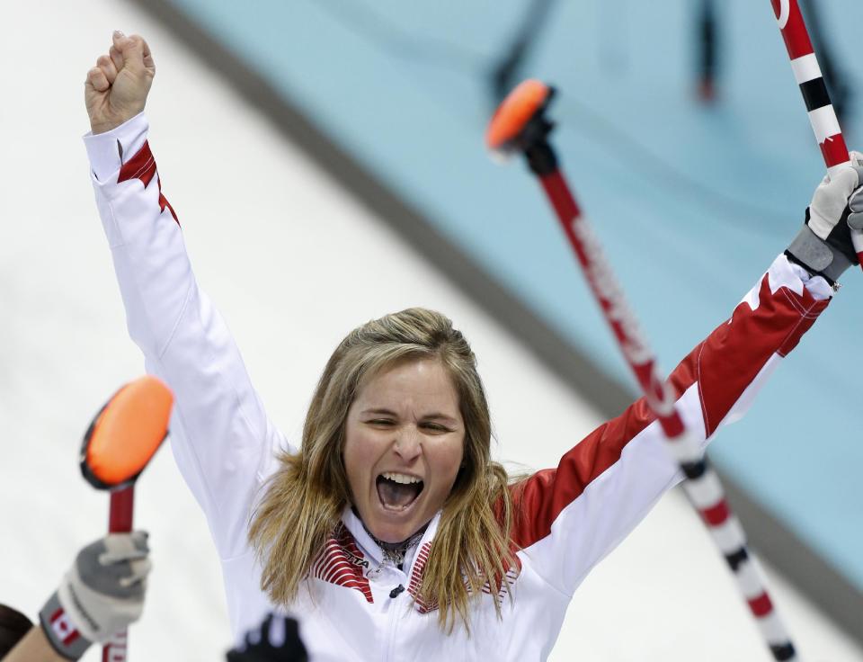 Canada’s skip Jennifer Jones celebrates after delivering the last rock during the women's curling semifinal game against Britain at the 2014 Winter Olympics, Wednesday, Feb. 19, 2014, in Sochi, Russia. (AP Photo/Robert F. Bukaty)