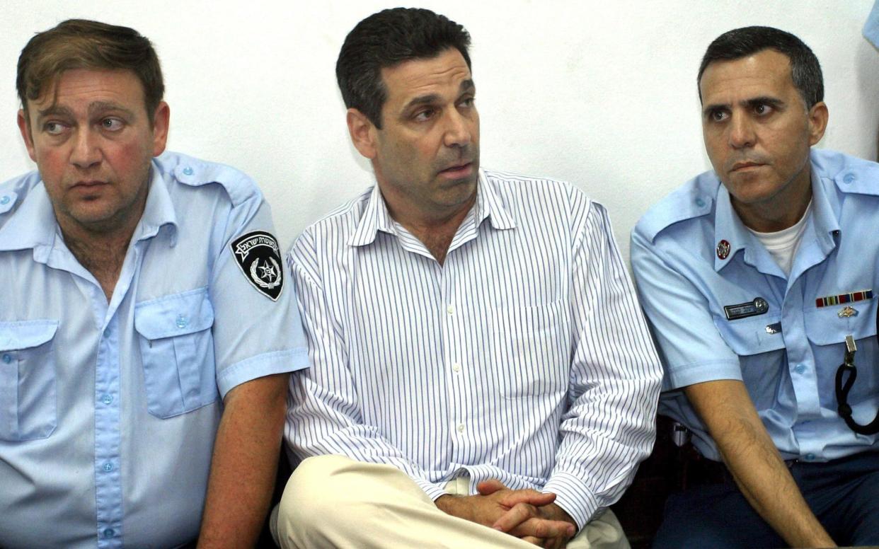 In this file photo taken on April 22, 2004, former Israeli energy minister Gonen Segev appears at the Tel Aviv district tribunal - AFP