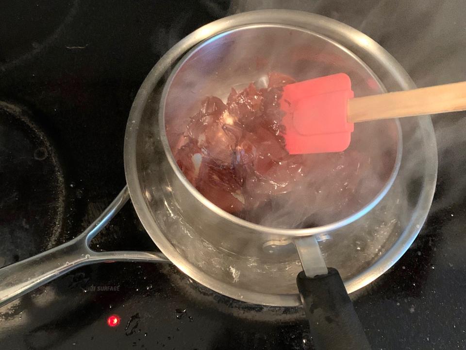 Melting the chocolate for celebration cake