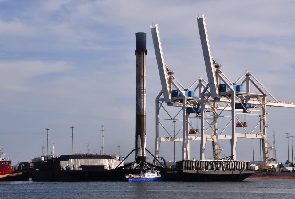 The SpaceX drone ship A Shortfall of Gravitas returns to Port Canaveral with a Falcon 9 first-stage booster in August 2021.