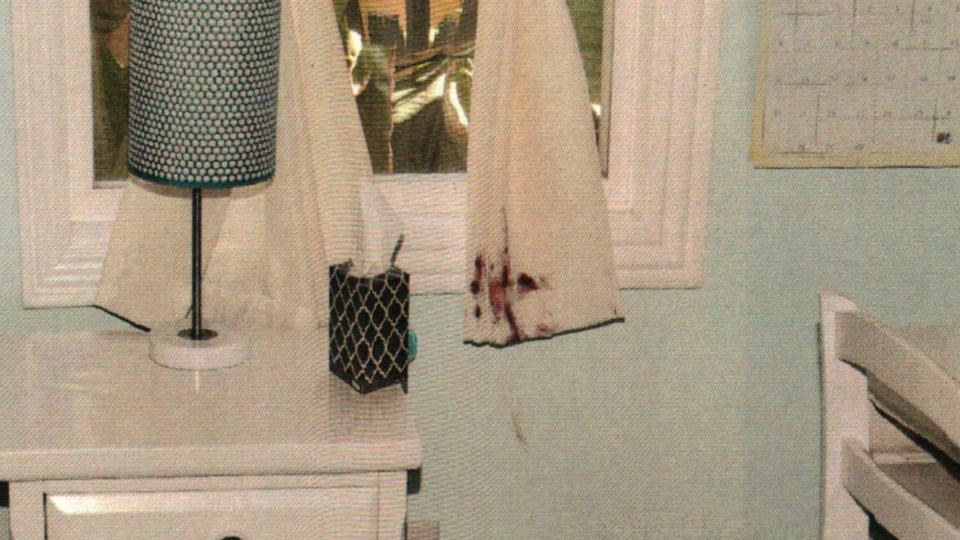 Blood can be seen on curtains in Mary-Katherine's bedroom where her mom had been sleeping. Blood was also found on the wall and nightstand. / Credit: Orange County Superior Court
