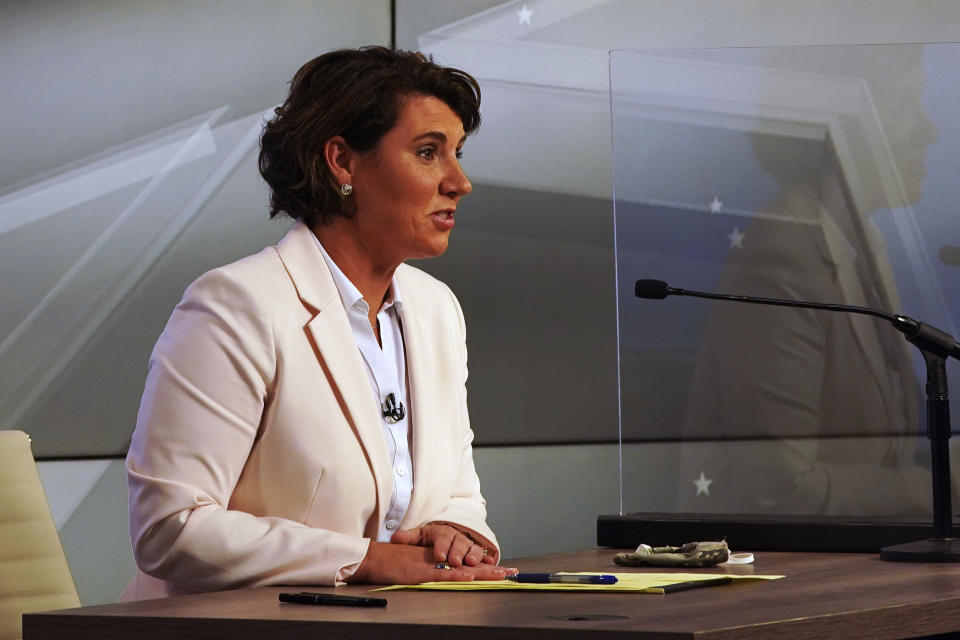 Democratic candidate for US Senate Amy McGrath speaks during a debate with Senate Majority Leader Mitch McConnell, R-Ky., in Lexington, Ky., Monday, Oct. 12, 2020. (Michael Clubb, The Kentucky Kernel via AP Pool)