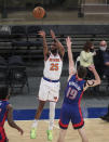 New York Knicks forward Reggie Bullock (25) takes a 3-point shot in the third quarter against the Detroit Pistons in an NBA basketball game Thursday, March 4, 2021, in New York. (Wendell Cruz/Pool Photo via AP)