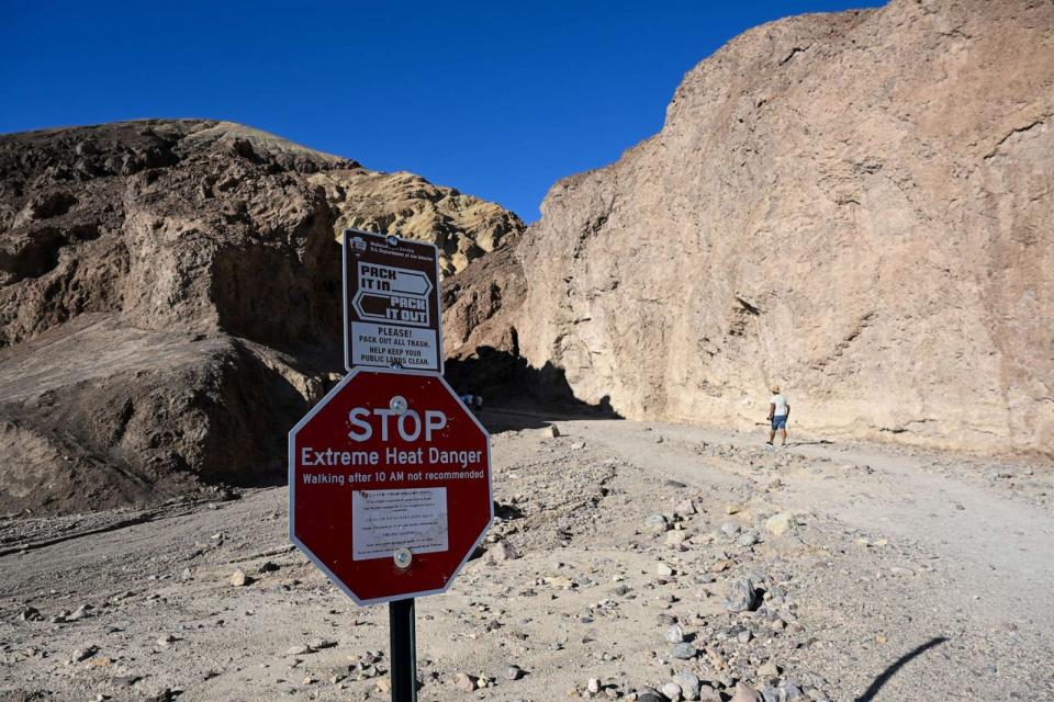 PHOTO: A sign reads 'Extreme Heat Danger' at the Golden Canyon Trailhead, July 9, 2023, as 120 Fahrenheit is expected in Death Valley, Calif. (Tayfun Coskun/Anadolu Agency via Getty Images)