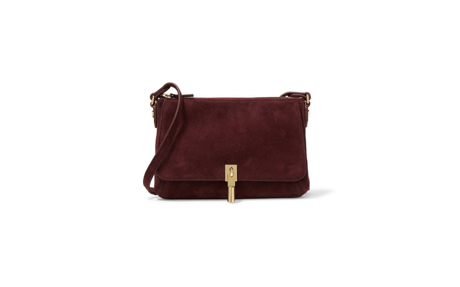 <p>This bordeaux-colored beauty is perfect for those nights when youd really just like your bag to match <a rel="nofollow noopener" href="http://www.travelandleisure.com/food-drink/wine" target="_blank" data-ylk="slk:your wine;elm:context_link;itc:0;sec:content-canvas" class="link ">your wine</a>.</p><p>To buy: <a rel="nofollow noopener" href="http://click.linksynergy.com/fs-bin/click?id=93xLBvPhAeE&subid=0&offerid=364103.1&type=10&tmpid=2425&RD_PARM1=http%3A%2F%2Fwww1.bloomingdales.com%2Fshop%2Fproduct%2Felizabeth-james-suede-cynnie-micro-crossbody%3FID%3D1705613%26CategoryID%3D16958&u1=TL_crossbodybags" target="_blank" data-ylk="slk:bloomingdales.com;elm:context_link;itc:0;sec:content-canvas" class="link ">bloomingdales.com</a>, $295.</p>