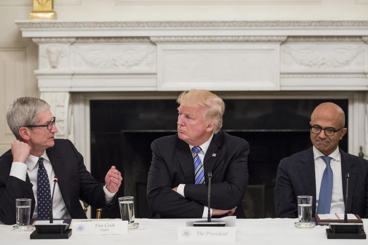 Hi-tech high table: the President with CEOs Tim Cook of Apple and Satya Nadella of Microsoft: Getty Images