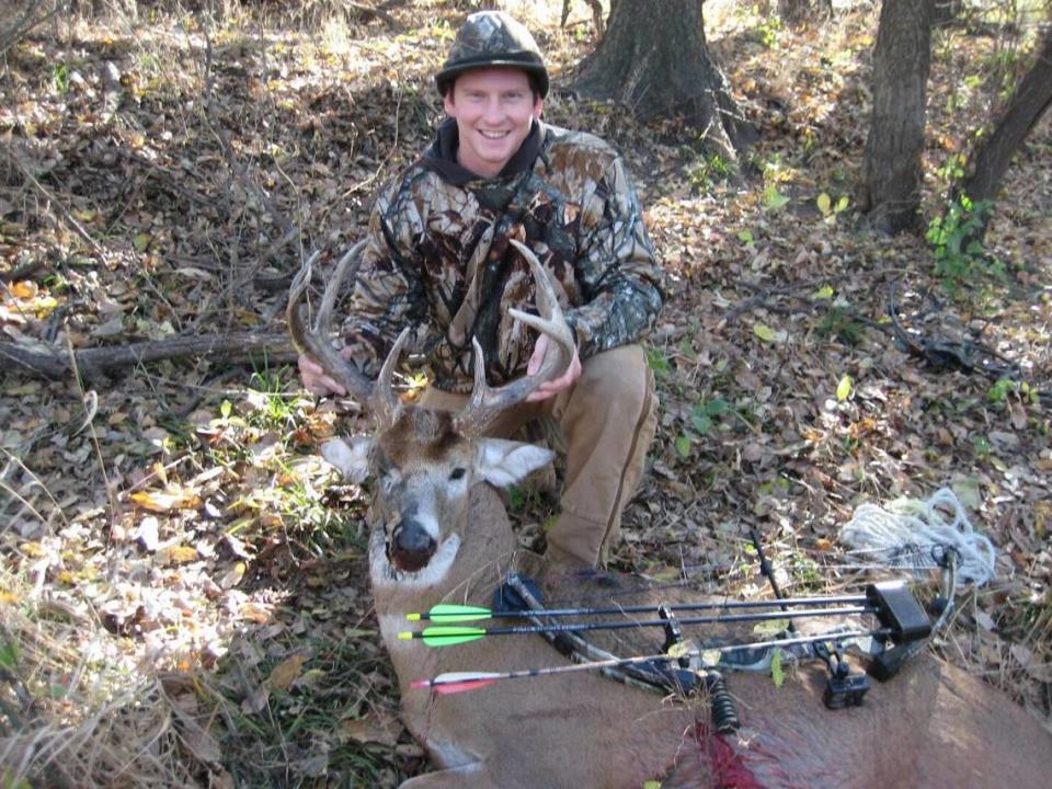Chance Swaim poses with a white-tailed buck he harvested on Nov. 6, 2010, in Kansas. The eight-point buck had an uncommon “double bib” and weighed more than 200 lbs.
