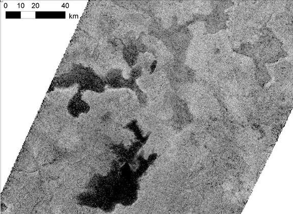 Lakes on Saturn's moon Titan reflect radio waves in varying ways in this image from NASA's Cassini spacecraft. Image released Jan. 8, 2013.